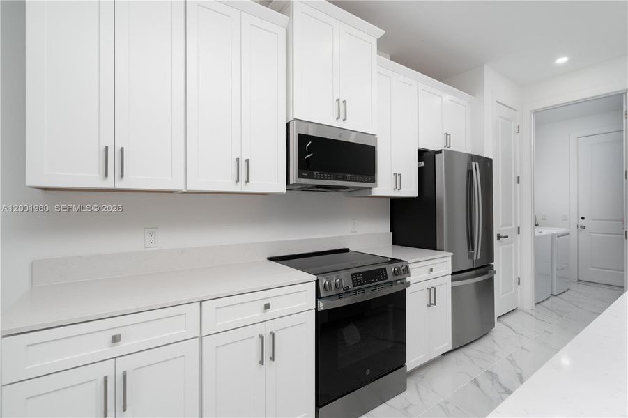 Furnished interior view inside a new home in , Lehigh Acres (Image 10).