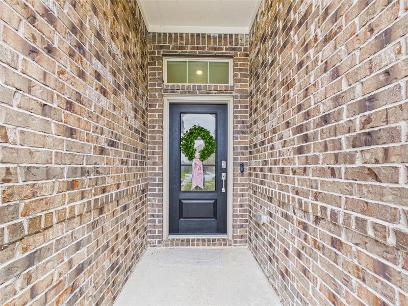 Exterior details and patio area of a home in Sterling Point at Baytown Crossings: Wildflower II Collection, Baytown (Image 4). Exterior details and patio area of a home in Sterling Point at Baytown Crossings: Wildflower II Collection, Baytown (Image 4).