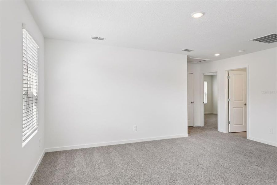 Spacious, unfurnished interior of a new home in Flagler Village - Classic Series, Palm Coast (Image 26). Spacious, unfurnished interior of a new home in Flagler Village - Classic Series, Palm Coast (Image 26).