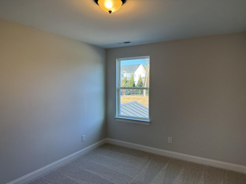 Spacious, unfurnished interior of a new home in Enclave at Traditions Townhomes, Wake Forest (Image 15).