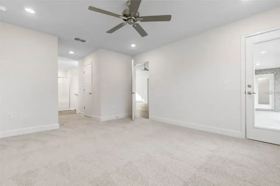Representative unfurnished interior of a home built from the 2265 by Adams Homes in Flagler Estates, Hastings (Image 46).