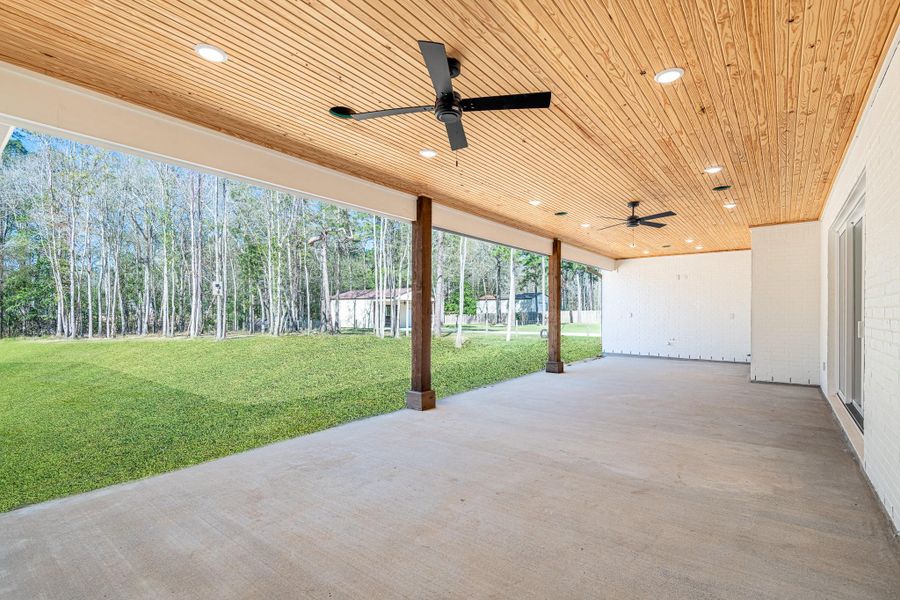 Exterior details and patio area of a home in , Splendora (Image 29).