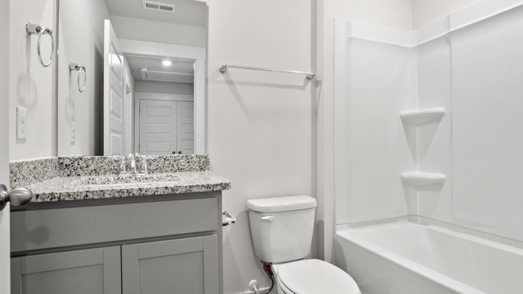 Furnished interior view inside a new home in Townes at Seabrooke, Leland (Image 13).