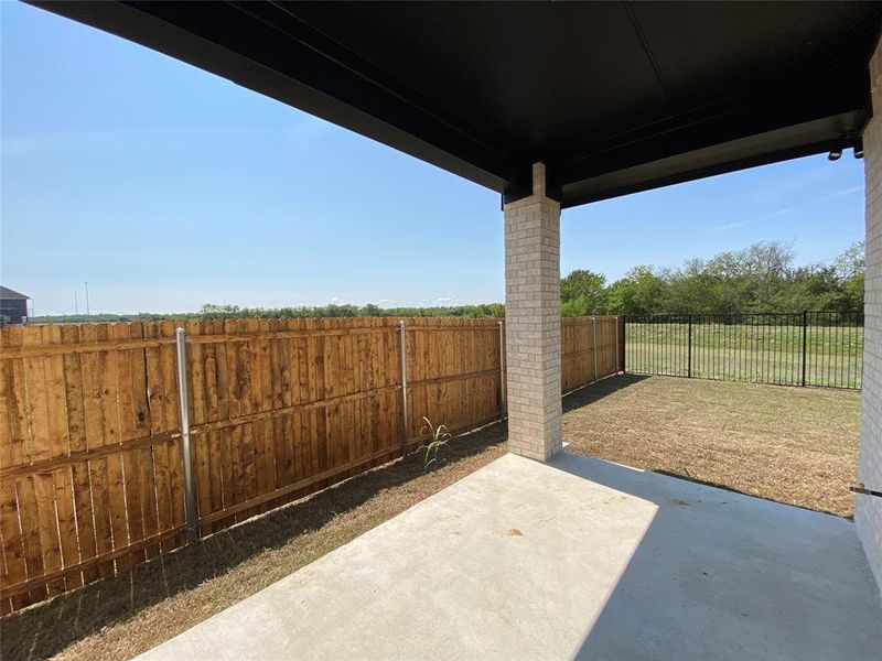 Nice covered back patio to grill & enjoy the outdoors Nice covered back patio to grill & enjoy the outdoors