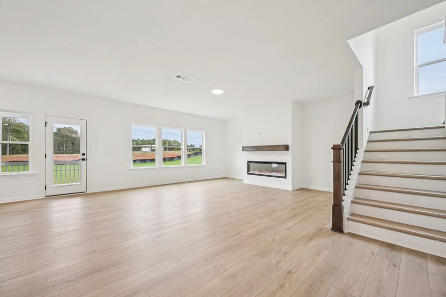 Family Room featuring the AW Collection® Serene - Open space with natural finishes and light.