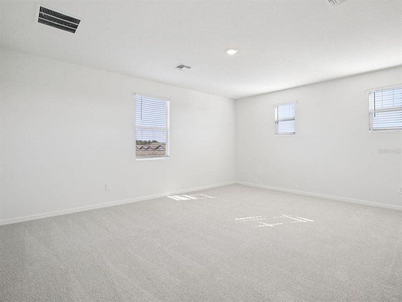 Spacious, unfurnished interior of a new home in Coasterra - Reserve Series, Palmetto (Image 14).