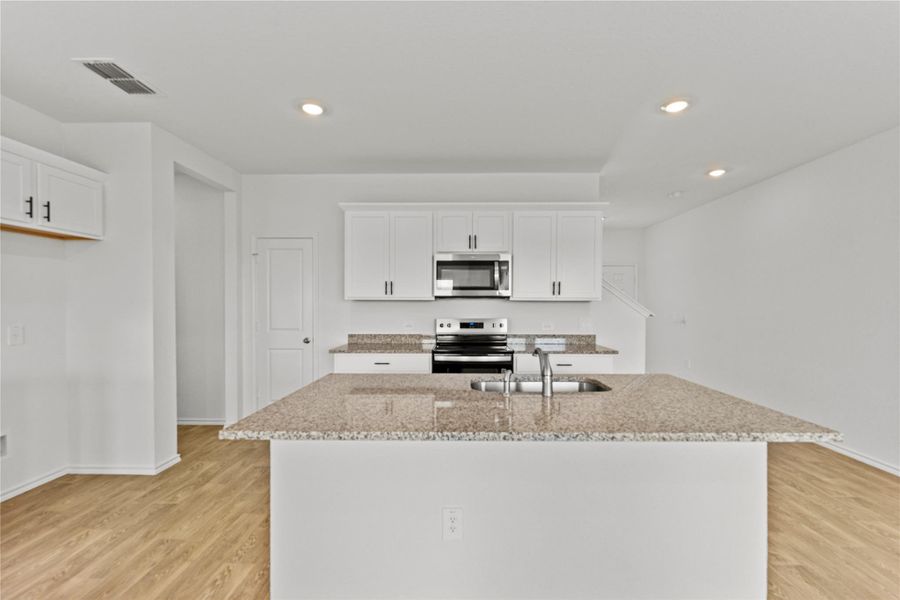 Furnished interior view inside a new home in Palomino, Manor (Image 10).