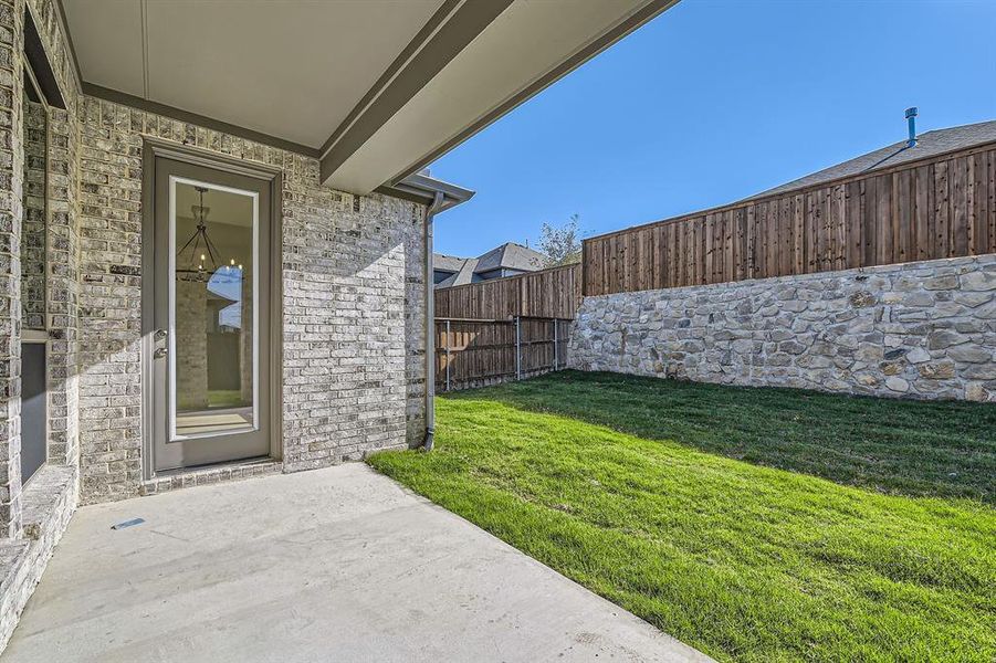 View of yard featuring a patio