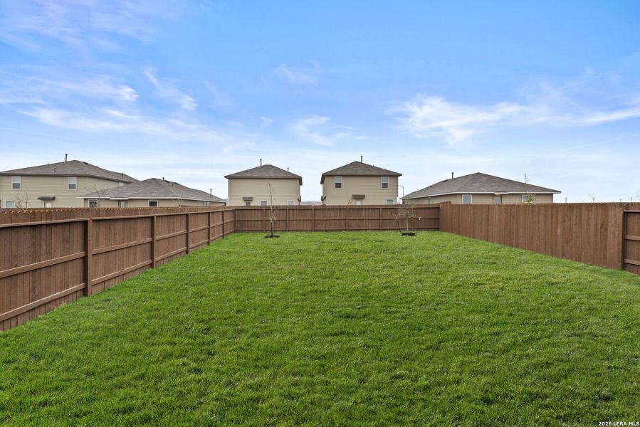 Exterior details and patio area of a home in Avenida, Converse (Image 2).