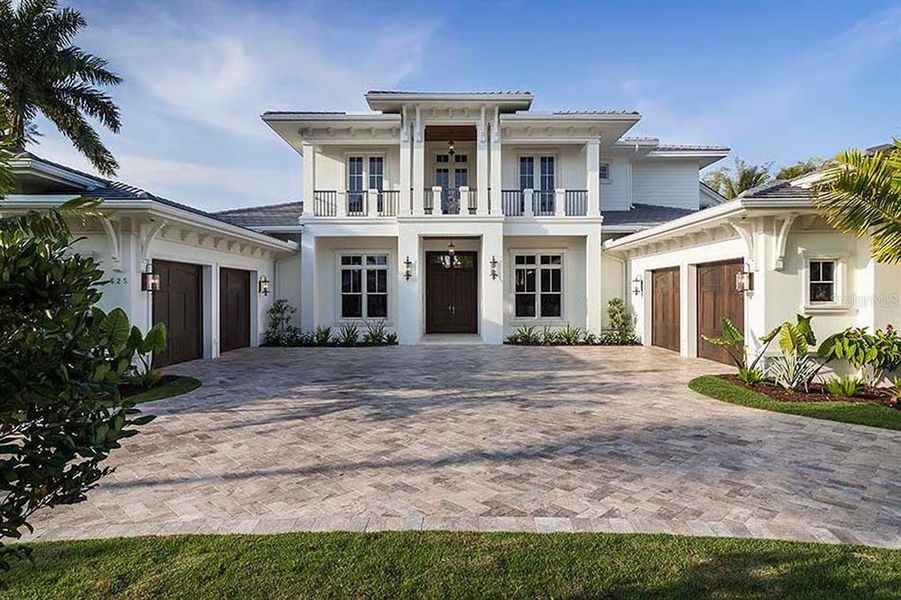 Front exterior of a new home in , Tavares, FL, highlighting curb appeal (Image 2). Front exterior of a new home in , Tavares, FL, highlighting curb appeal (Image 2).