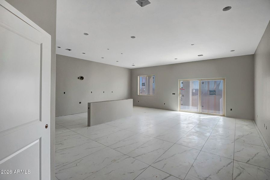 Great room looking onto kitchen
