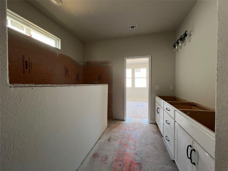 In-progress construction of a new home in Rolling Glen, Hutto, TX (Image 25).