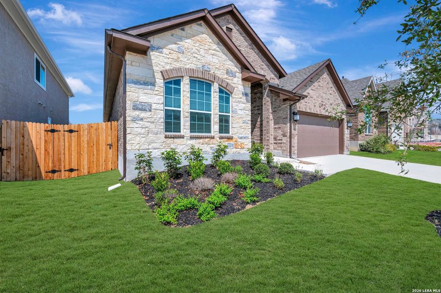 Front exterior of a new home in Davis Ranch 50', San Antonio, TX, highlighting curb appeal (Image 24).