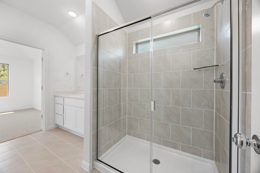 Primary Bath in the Cypress home plan by Trophy Signature Homes - REPRESENTATIVE PHOTO