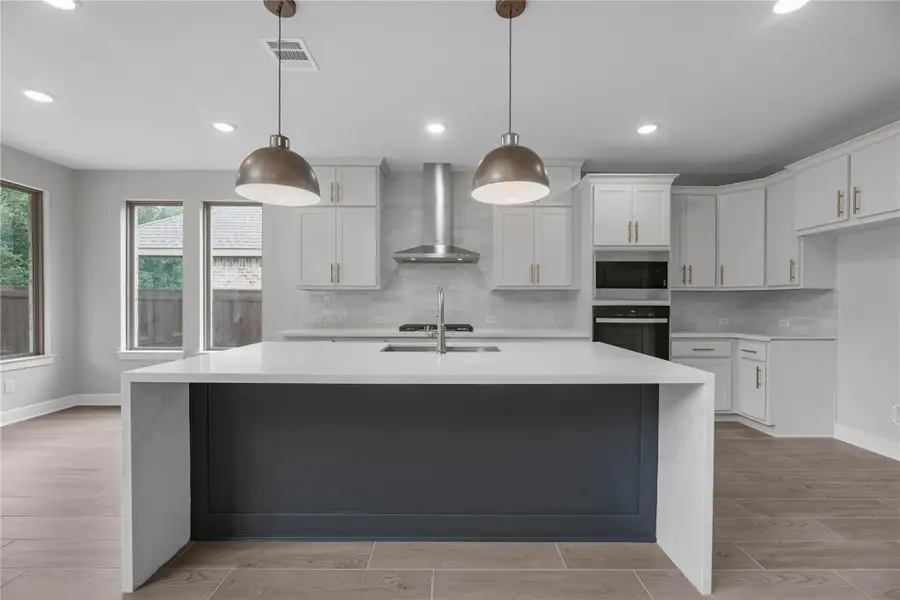 Furnished interior view inside a new home in The Trails - 60', New Caney (Image 7).