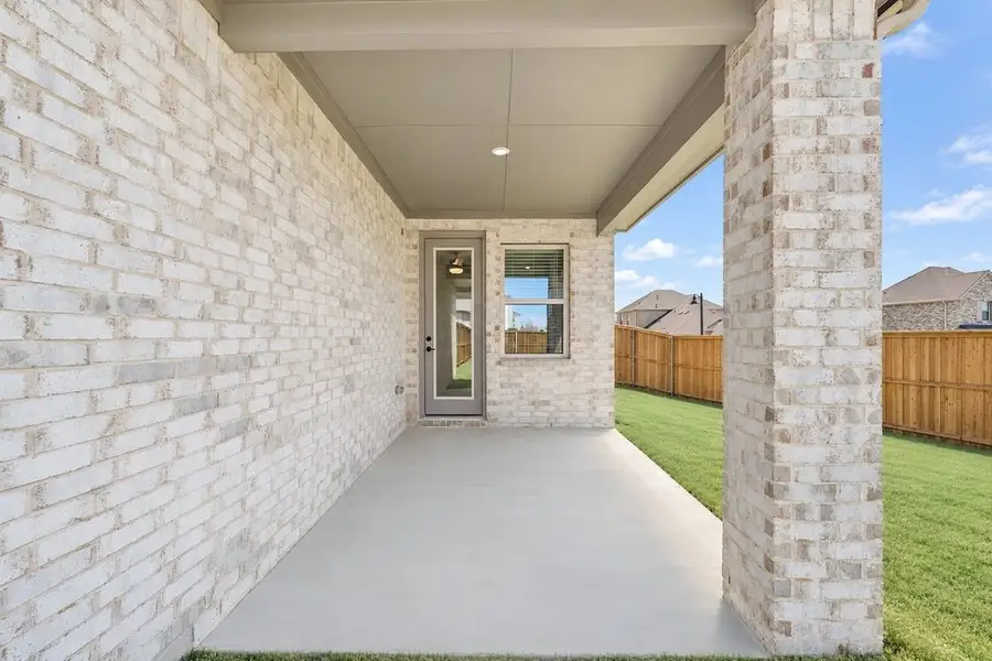 Exterior details and patio area of a home in Cross Creek Meadows, Celina (Image 3).