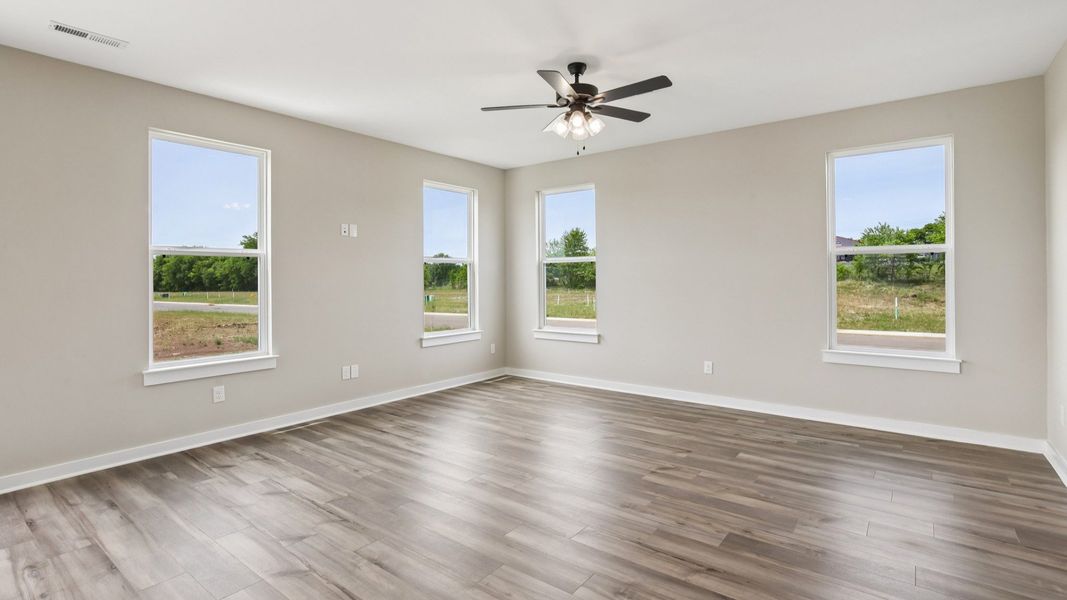 Living Room with hard surface flooring and large windows Living Room with hard surface flooring and large windows
