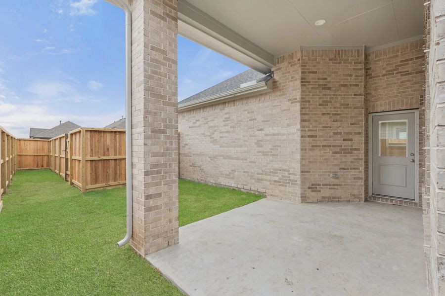 Representative exterior details of a home built from the St Andrews by Chesmar Homes in Riceland Alley Loads, Mont Belvieu (Image 36).