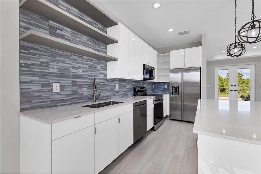 Furnished interior view inside a new home in , Port Charlotte (Image 9). Furnished interior view inside a new home in , Port Charlotte (Image 9).