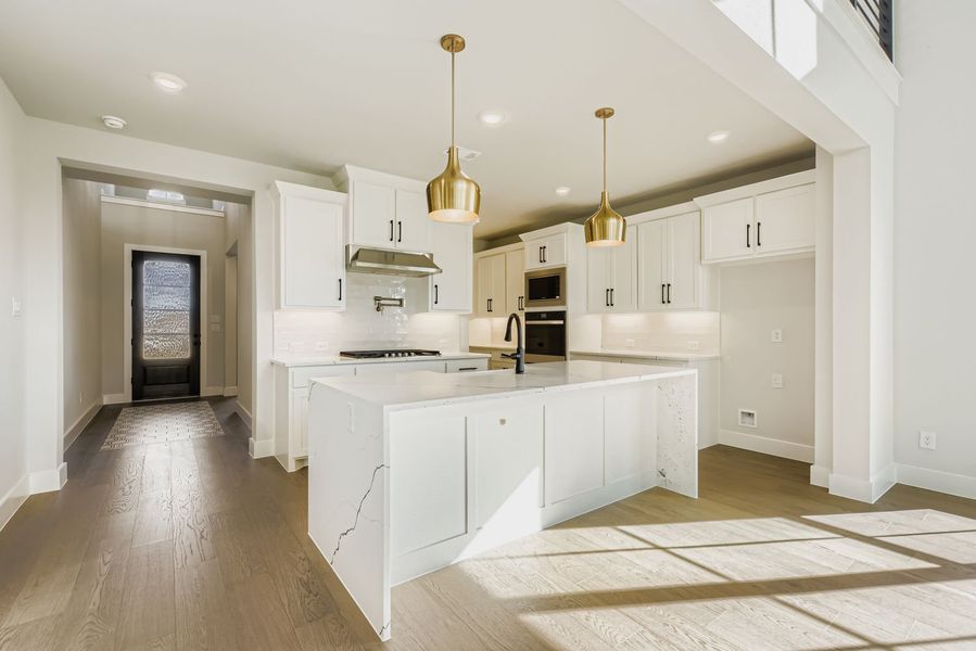 Gourmet Kitchen with Oversized Island| Plan 1581 | Representative Photo