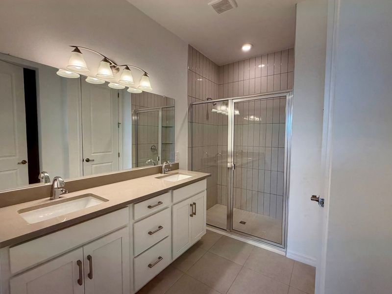Representative furnished interior of a home built from the Juno by William Ryan Homes in The Sanctuary – Resort Collection, Punta Gorda (Image 11).
