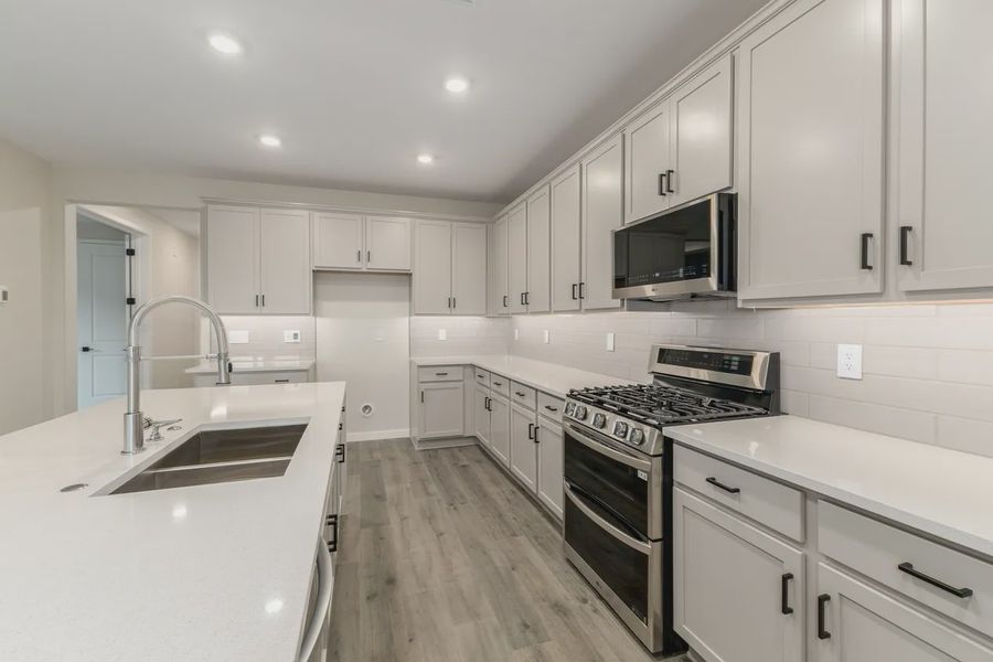 Furnished interior view inside a new home in Avanti at Granite Vista, Waddell (Image 10).