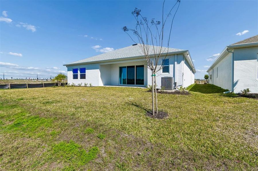 Exterior details and patio area of a home in Coasterra, Palmetto (Image 18).