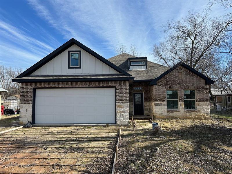 Front exterior of a new home in , Celeste, TX, highlighting curb appeal (Image 2). Front exterior of a new home in , Celeste, TX, highlighting curb appeal (Image 2).
