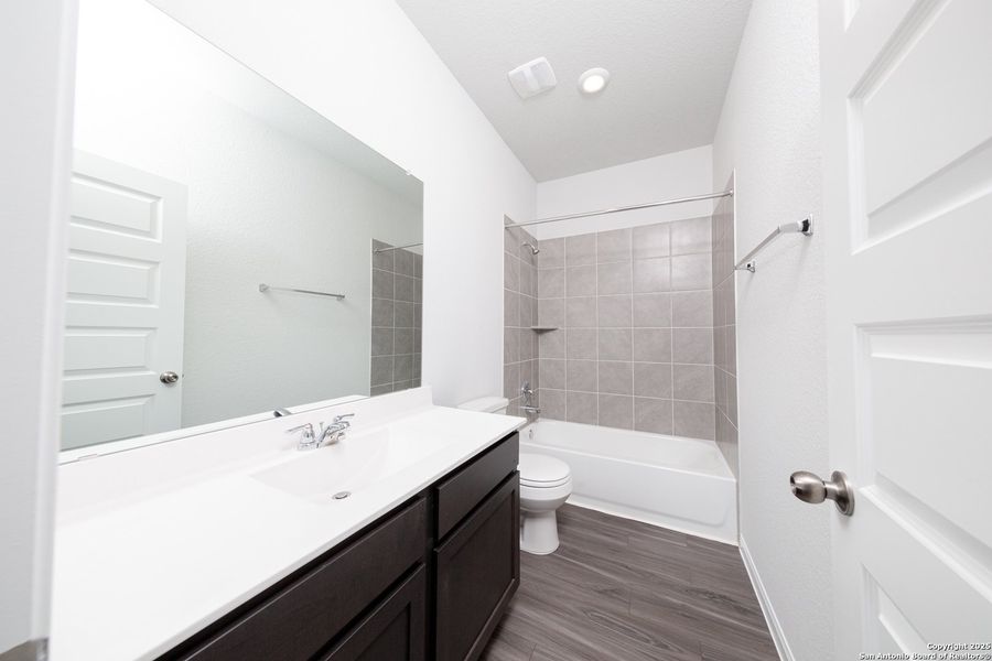 Furnished interior view inside a new home in Cinco Lakes, San Antonio (Image 3).