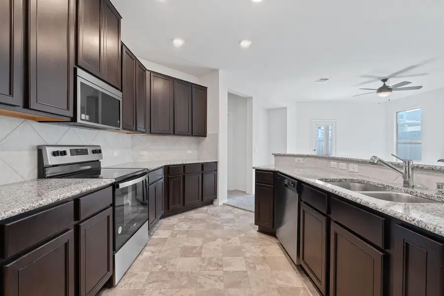 Furnished interior view inside a new home in EastVillage - Heritage Collection, Manor (Image 5). Furnished interior view inside a new home in EastVillage - Heritage Collection, Manor (Image 5).