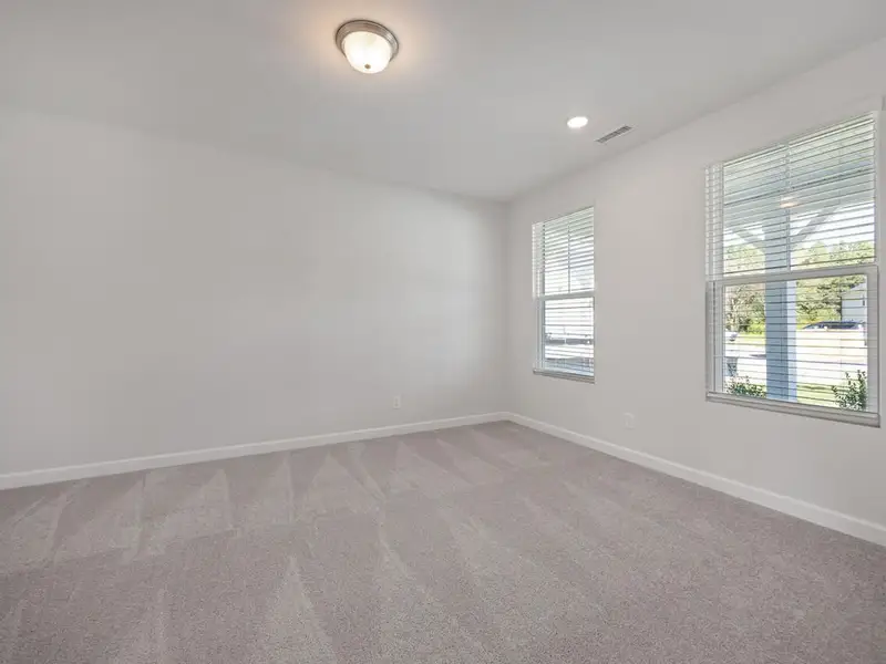 Spacious, unfurnished interior of a new home in Wellers Knoll, Lillington (Image 14).