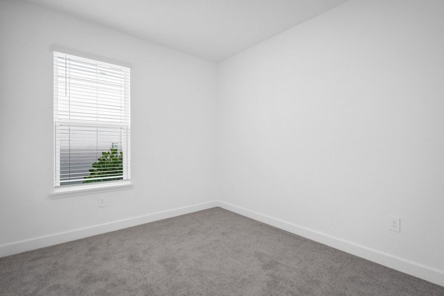 Spacious, unfurnished interior of a new home in The Cove at West Port, Port Charlotte (Image 13).