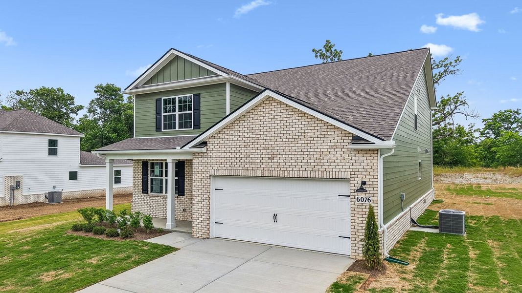 Front exterior of a new home in Pottsview, Smyrna, TN, highlighting curb appeal (Image 25). Front exterior of a new home in Pottsview, Smyrna, TN, highlighting curb appeal (Image 25).