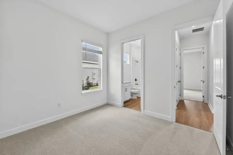 Representative unfurnished interior of a home built from the Sereno by Taylor Morrison in Esplanade at Pinewalk, St. Johns (Image 13).