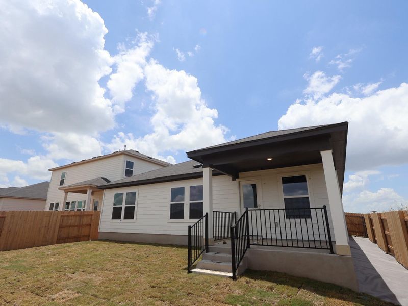 Exterior details and patio area of a home in Willow Springs, Buda (Image 3).