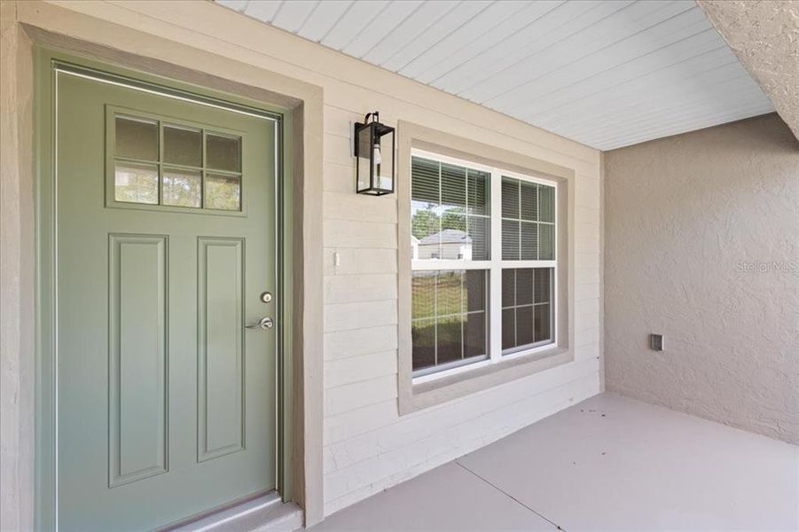 Exterior details and patio area of a home in , Citrus Springs (Image 28).