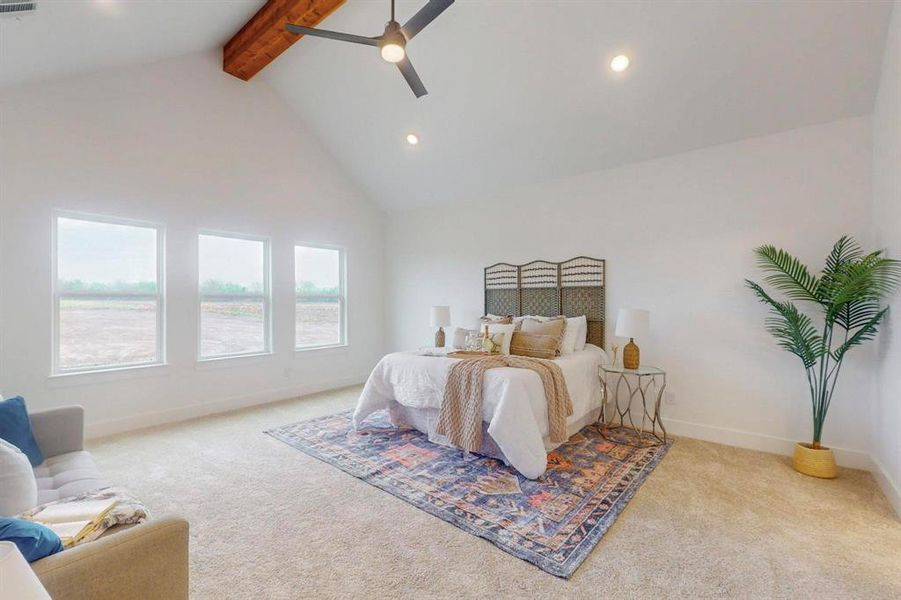 Carpeted bedroom with recessed lighting, high vaulted ceiling, baseboards, beamed ceiling, and a ceiling fan Carpeted bedroom with recessed lighting, high vaulted ceiling, baseboards, beamed ceiling, and a ceiling fan