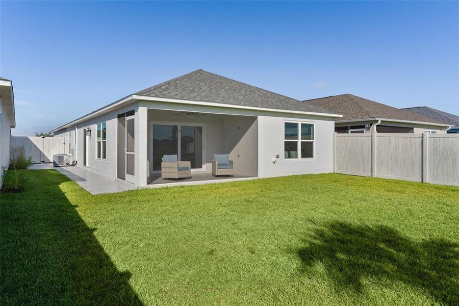 Exterior details and patio area of a home in , The Villages (Image 30). Exterior details and patio area of a home in , The Villages (Image 30).