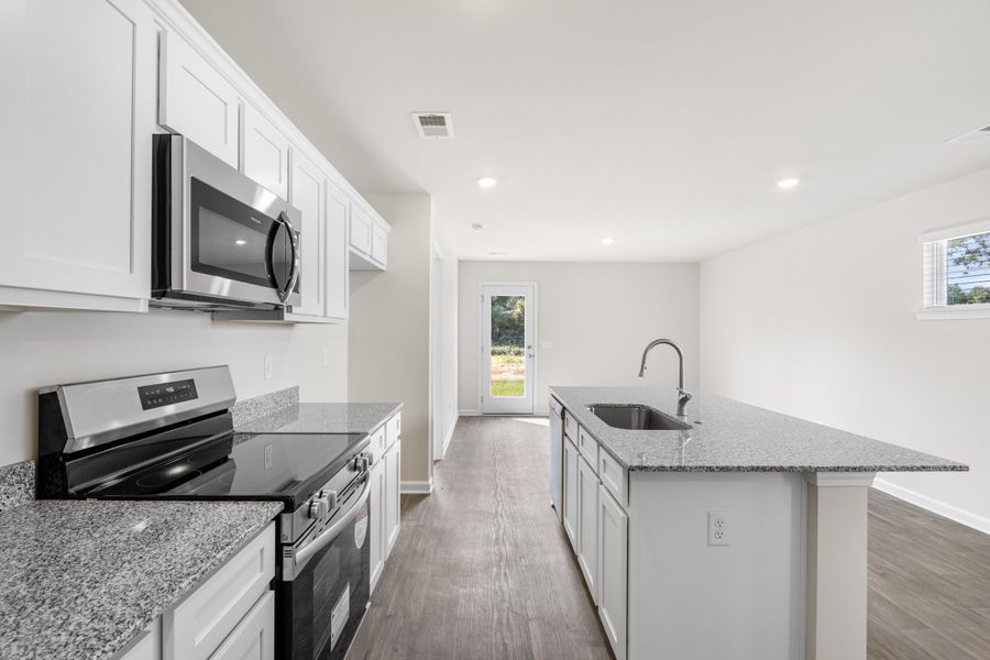 Furnished interior view inside a new home in Forts Ridge, Pelion (Image 6). Furnished interior view inside a new home in Forts Ridge, Pelion (Image 6).