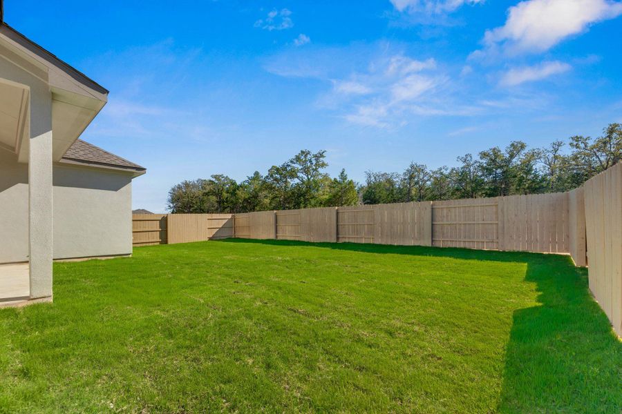 Exterior details and patio area of a home in The Colony - 50', Bastrop (Image 3). Exterior details and patio area of a home in The Colony - 50', Bastrop (Image 3).