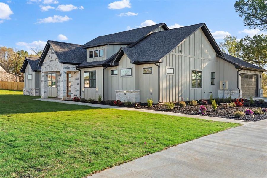 Front exterior of a new home in , Tyler, TX, highlighting curb appeal (Image 28).