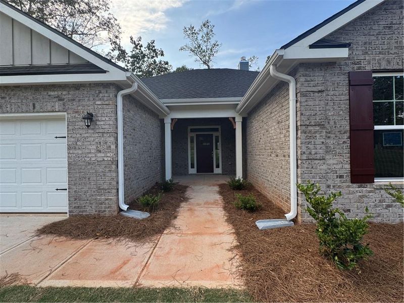 Exterior details and patio area of a home in Tuscany Hills, Douglasville (Image 17).