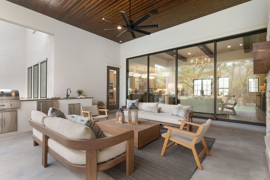 Exterior details and patio area of a home in Enchanted Bluff, Garden Ridge (Image 28).