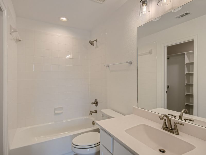 Plan 855 Secondary Bathroom Representative Photo