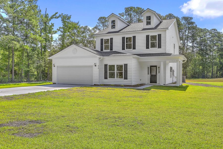 Front exterior of a new home in , Dorchester, SC, highlighting curb appeal (Image 29).