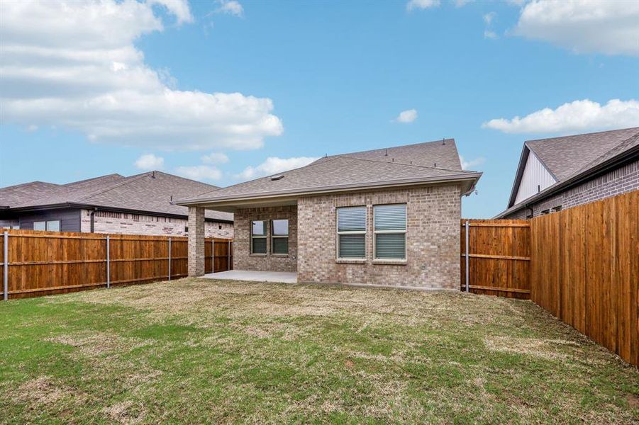 Exterior details and patio area of a home in Parks at Foster Crossing - Spring Series, Anna (Image 24).