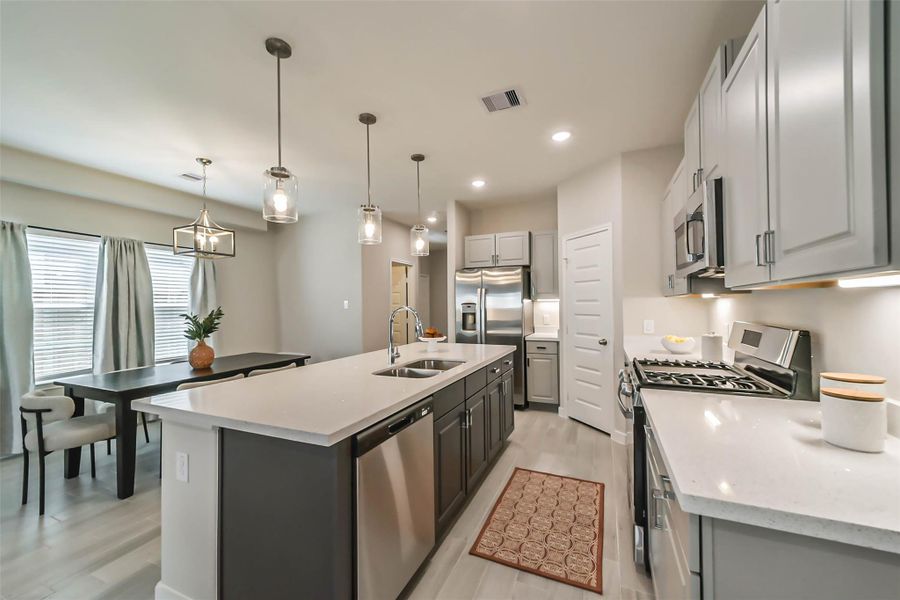 Photos are sample images from a previously built home with the same floor plan. Finishes and fixtures in the current home have been upgraded and may vary. Photos are sample images from a previously built home with the same floor plan. Finishes and fixtures in the current home have been upgraded and may vary.