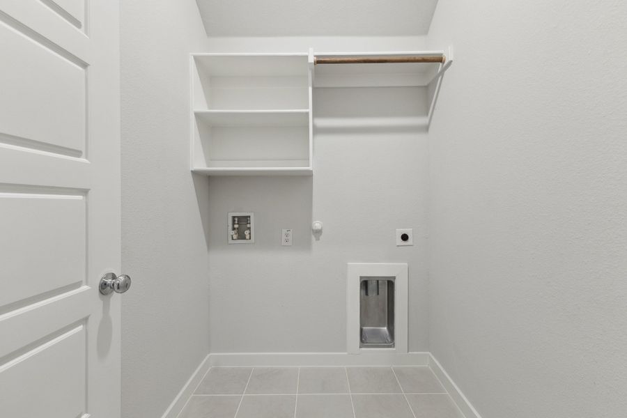 Utility room in the Quartz home plan by Trophy Signature Homes – REPRESENTATIVE PHOTO