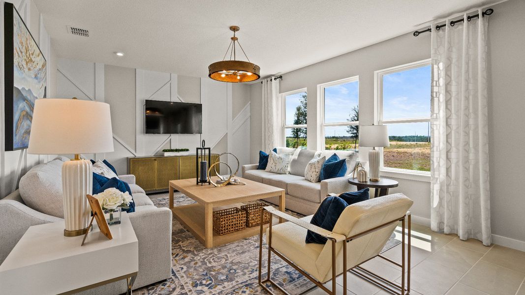 The First Floor Living Area in the Model Highbourne by DRB Homes in Hamilton Bluff located in Haines City, FL. The First Floor Living Area in the Model Highbourne by DRB Homes in Hamilton Bluff located in Haines City, FL.