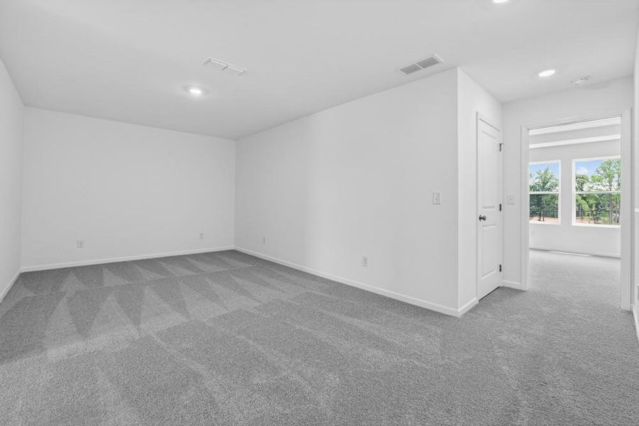 Spacious, unfurnished interior of a new home in Weatherfield, Buford (Image 22).